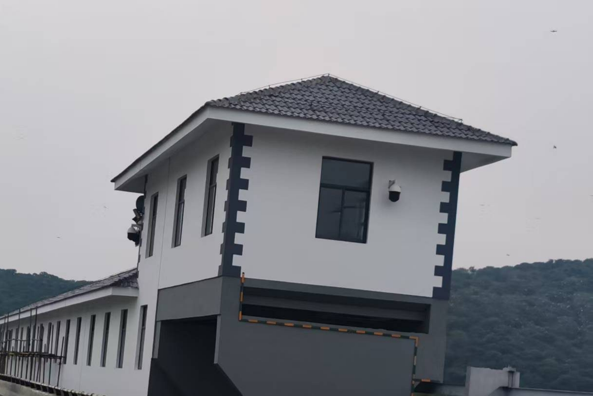 施工后-启闭机房外墙 (2).jpg 施工后-启闭机房外墙 (2).jpg